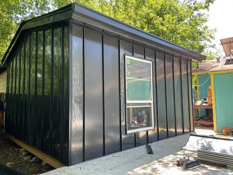 Black standing seam metal wall panels for Metal Roof Installation in Fircrest